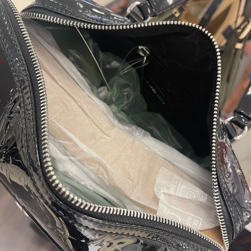 MICHAEL KORS Jet Set Md Patent Logo Debossed Duffle Crossbody Bag Duffel Silver